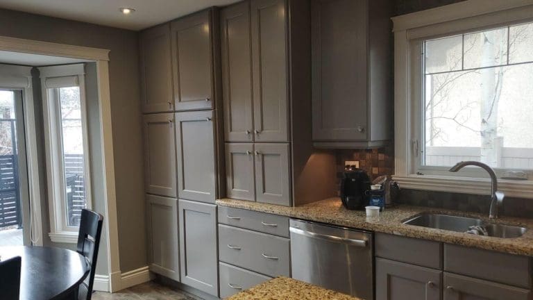 Large painted grey wall cabinets in NE Calgary